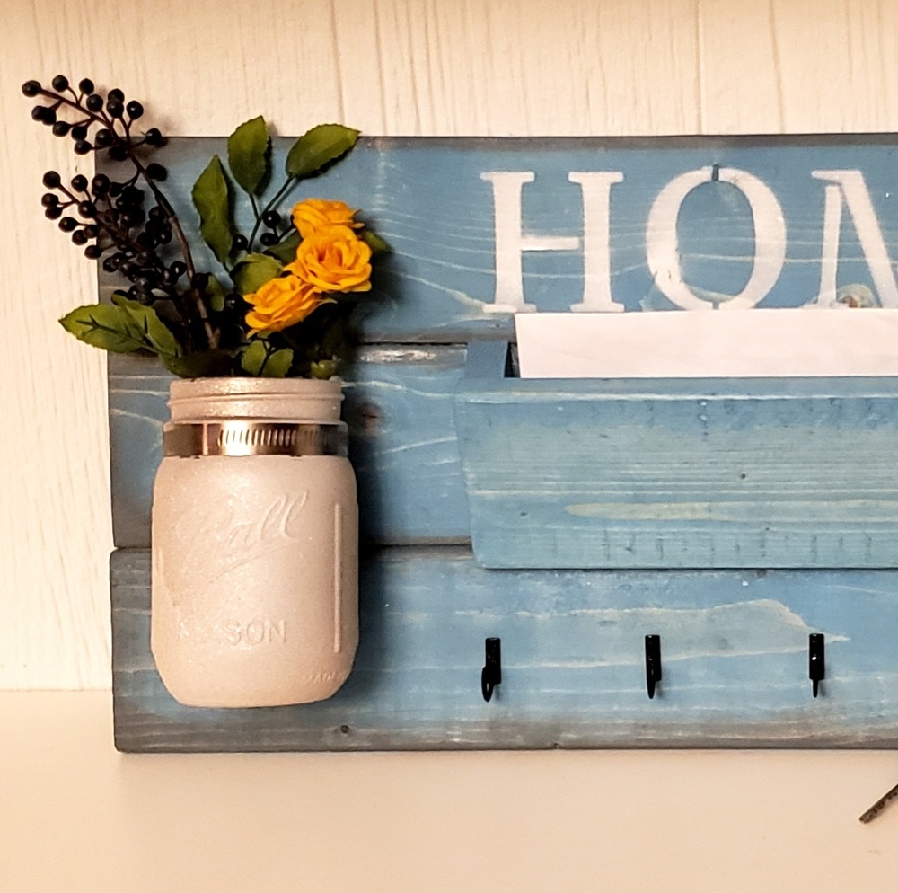 Envelope, keys, and flower holder